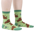 Lifestyle shot showing the socks on a person's legs, highlighting the fit and feel.