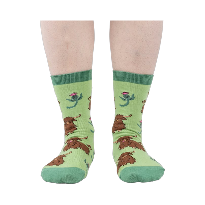Front view of the socks on a person's feet, showcasing the overall design and color combination.