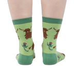 Rear view of the socks on a person's feet, giving a full view of the pattern.
