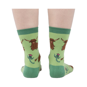 Rear view of the socks on a person's feet, giving a full view of the pattern.
