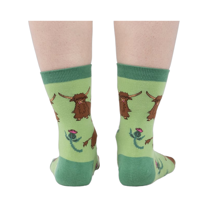 Rear view of the socks on a person's feet, giving a full view of the pattern.