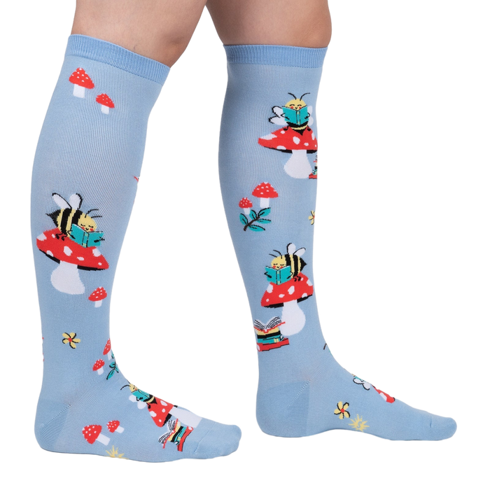 Lifestyle shot showing the socks on a person's legs, showcasing the fit and overall design.