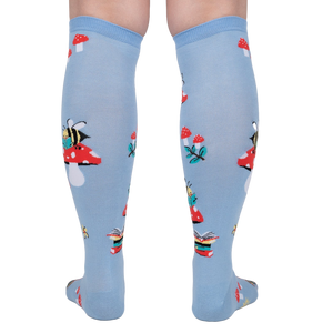 Rear view of the socks on a person's legs, highlighting the back pattern and design.