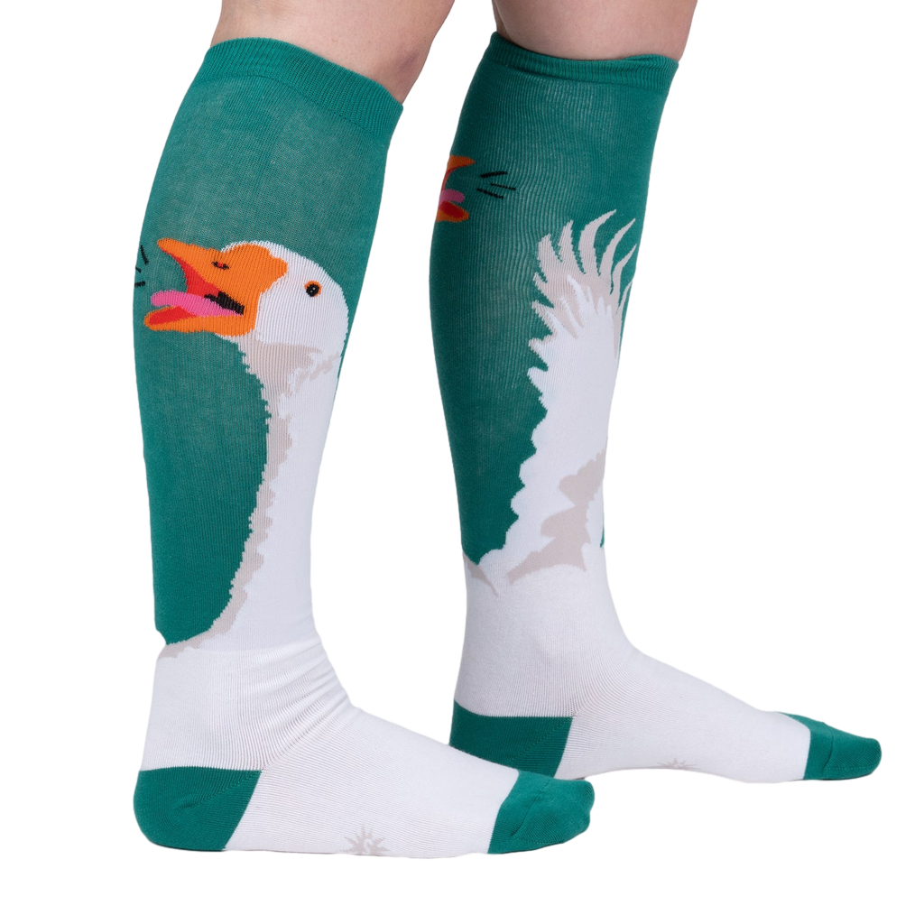 Lifestyle shot showing Honk! socks on a person's legs, highlighting the design and fit.