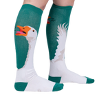 Lifestyle shot showing Honk! socks on a person's legs, highlighting the design and fit.