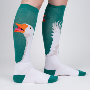 Lifestyle shot showing Honk! socks on a person's legs, highlighting the design and fit.