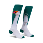 Pair of teal and white knee-high socks with a comical goose design. One sock shows the goose's head and neck; the other, its wings.