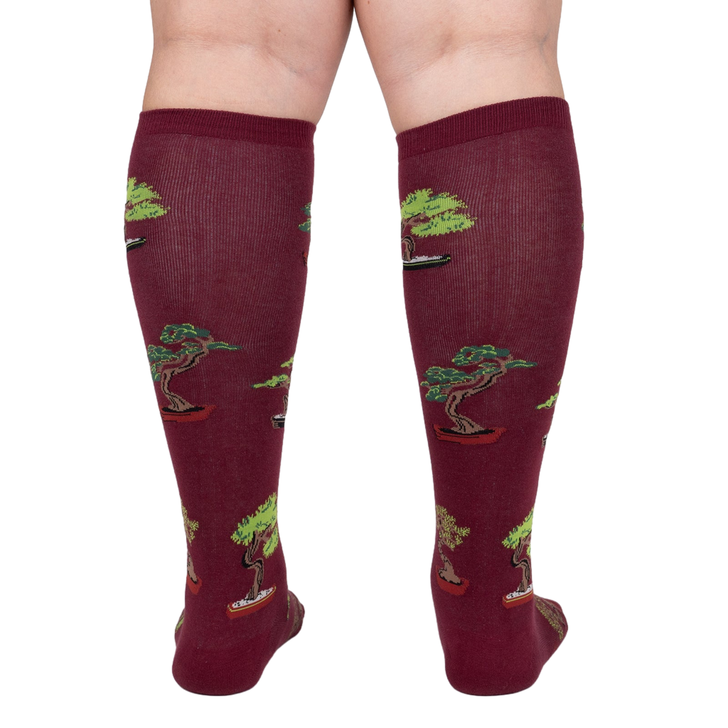 Back view of the socks, highlighting the full design repeat and overall appearance.
