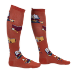 Lifestyle shot: Person wearing burnt orange True Crime knee-high socks.