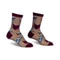 Pair of sheer beige ankle socks with a burgundy trim. Features a whimsical pattern of books and roses.