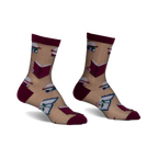 Pair of sheer beige ankle socks with a burgundy trim. Features a whimsical pattern of books and roses.