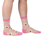 Lifestyle shot showing the socks on a person's legs, showcasing how they look when worn.