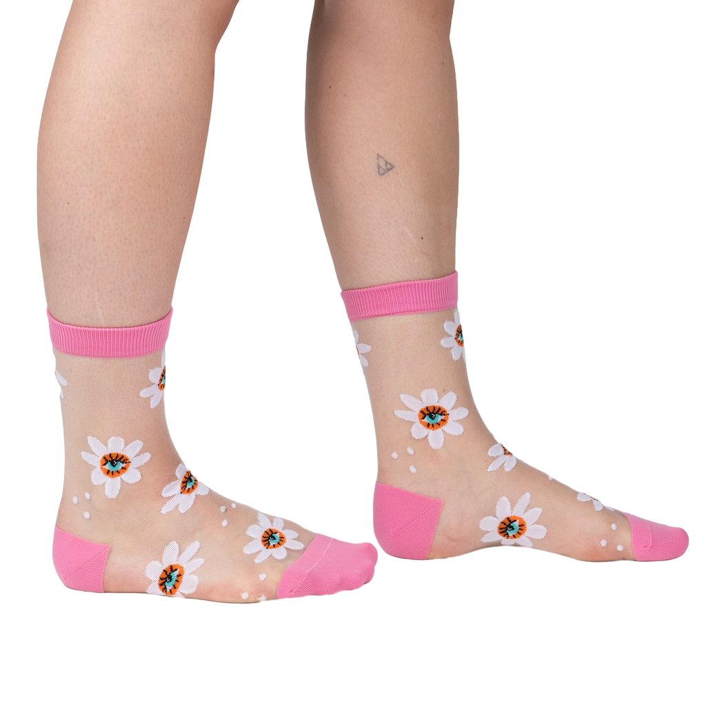 Lifestyle shot showing the socks on a person's legs, showcasing how they look when worn.