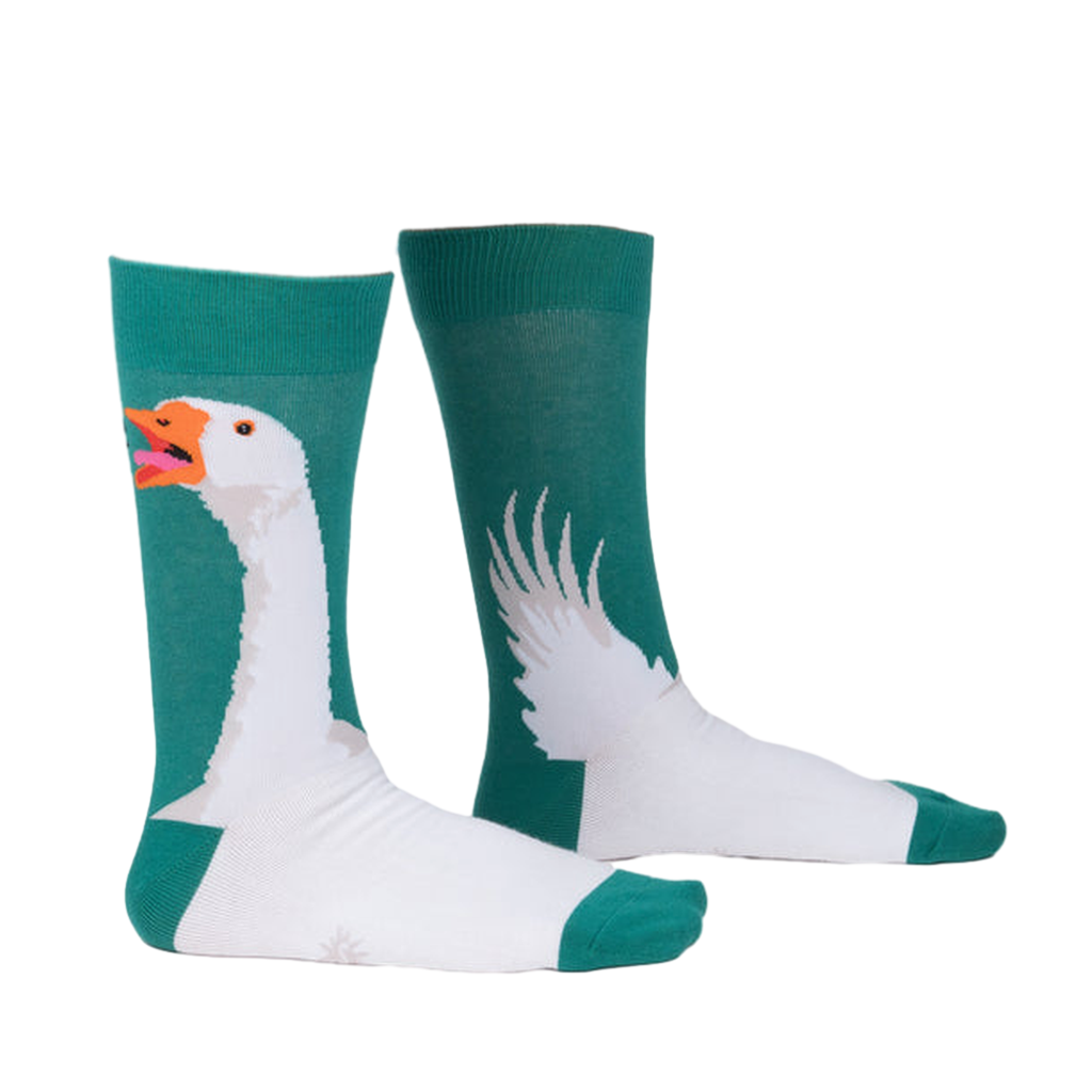 Lifestyle shot showing the socks on a person's legs. The socks are teal and white with a goose design.