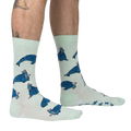 Lifestyle shot: Model's legs wearing the 'And I Will Walrus Love You' socks, showcasing fit and style.
