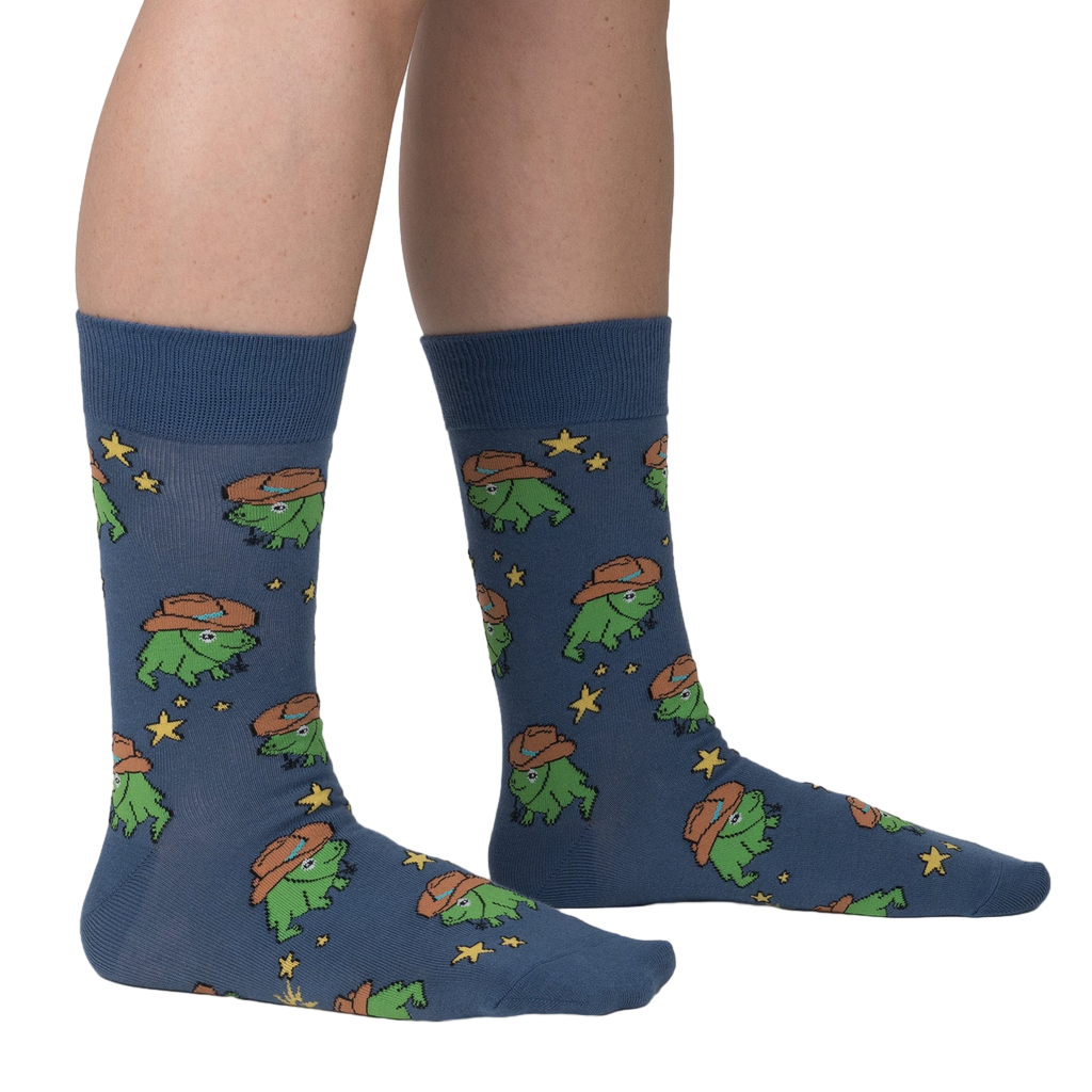Lifestyle shot of a person wearing 'Yee Frog!' socks, showing how they look when worn.