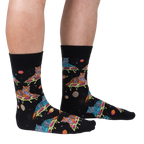 Lifestyle shot of a person wearing the 'Eye of the Tiger' socks, showcasing the design and fit.