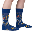 Lifestyle shot of 'Let it Bee' socks on a person's legs, showcasing the design and fit.