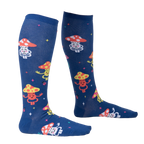 Lifestyle shot showing the socks on a person's legs.  The socks are navy blue with a fun mushroom pattern.