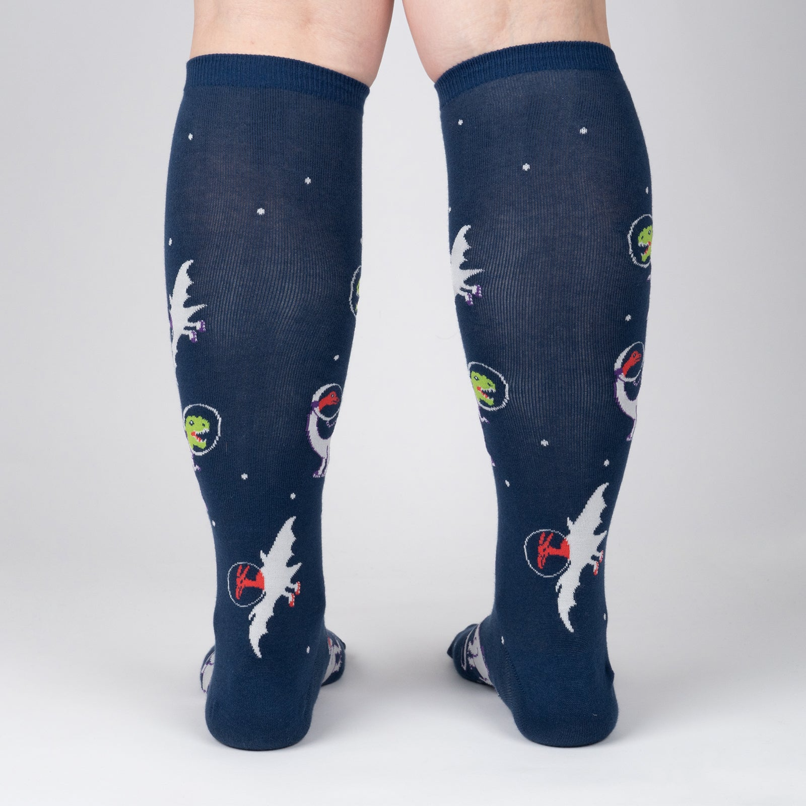 Back view of the 'I Need Space' knee-high socks, showing the full design pattern on both socks. The image is against a white background.
