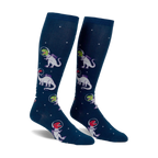 Pair of navy blue knee-high socks with a repeating pattern of white and purple dinosaurs wearing astronaut helmets in space.