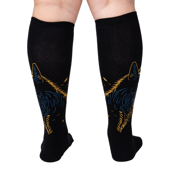 Rear view of the Night Cat socks showcasing the cat design on both socks.