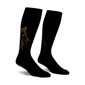 Pair of black knee-high socks with a gold and blue cat design. The cat's face is prominently featured on each sock.