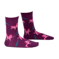 Pair of purple crew socks with a fun pattern of pink axolotls and teal ferns. 