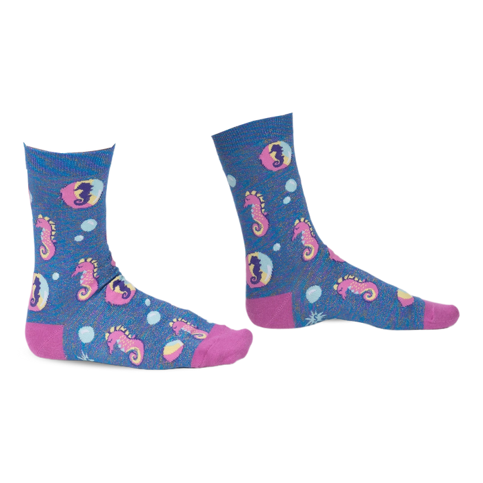 Pair of crew socks in blue with pink seahorse and bubble design.  Shimmery accents add extra flair.