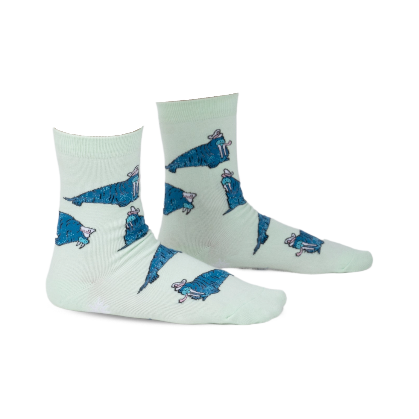 Pair of mint green crew socks featuring a repeating pattern of cartoon walruses wearing sombreros.  The socks have a playful design and blue walrus accents.