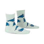 Pair of mint green crew socks featuring a repeating pattern of cartoon walruses wearing sombreros.  The socks have a playful design and blue walrus accents.