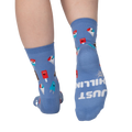 Rear view of periwinkle blue crew socks; the words 'JUST CHILLIN' are spelled out on one heel.