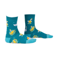 Pair of teal crew socks with a whimsical pattern of geese floating on inner tubes and swimming. Yellow and white geese on teal background.
