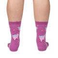 Lifestyle shot showing the 'When Pigs Fly' socks on a person's legs, showcasing the sock's fit and design.
