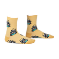 Pair of pastel yellow crew socks featuring a repeating pattern of raccoons enjoying ramen. 