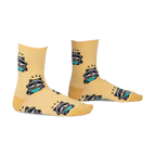 Pair of pastel yellow crew socks featuring a repeating pattern of raccoons enjoying ramen. 