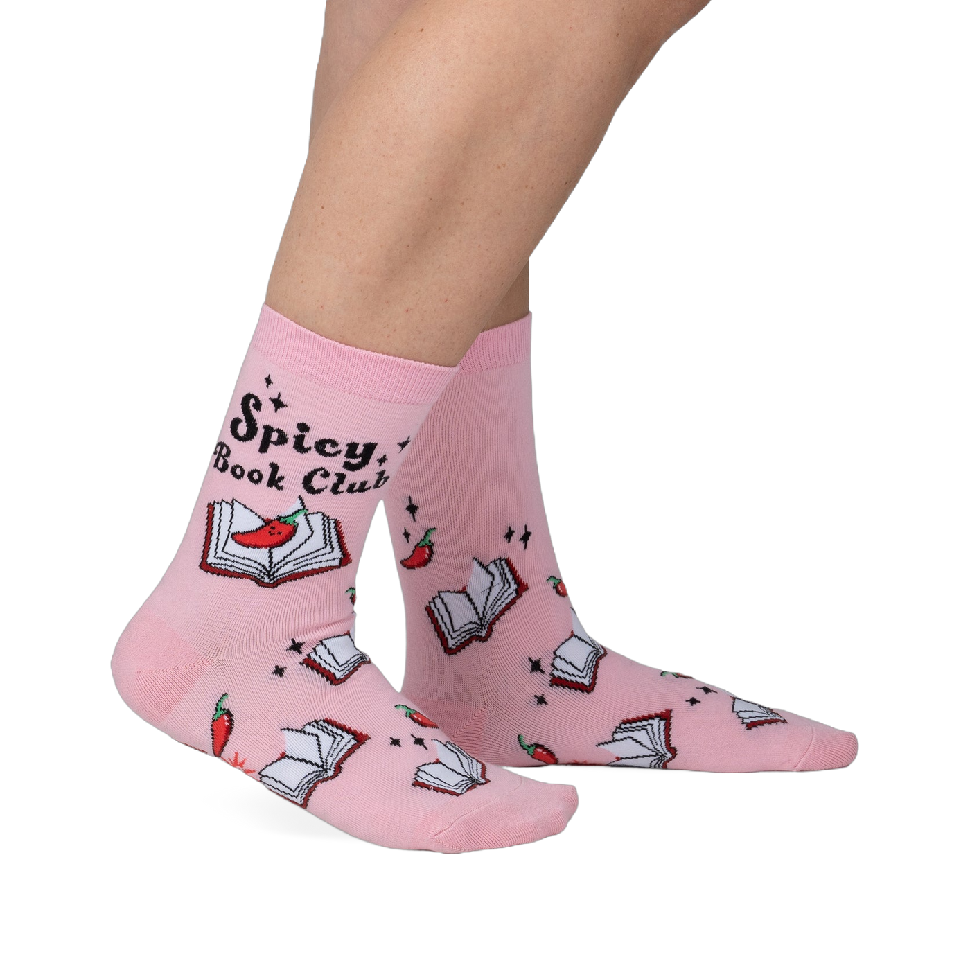 Pink crew socks with a playful design.  Features an illustration of books, chili peppers, and the text "Spicy Book Club".