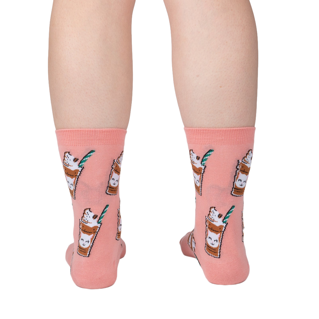 Back view of Cat-puccino socks on a person's legs, showcasing the full design on the socks against a light background.