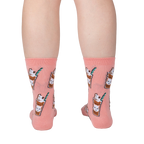 Back view of Cat-puccino socks on a person's legs, showcasing the full design on the socks against a light background.