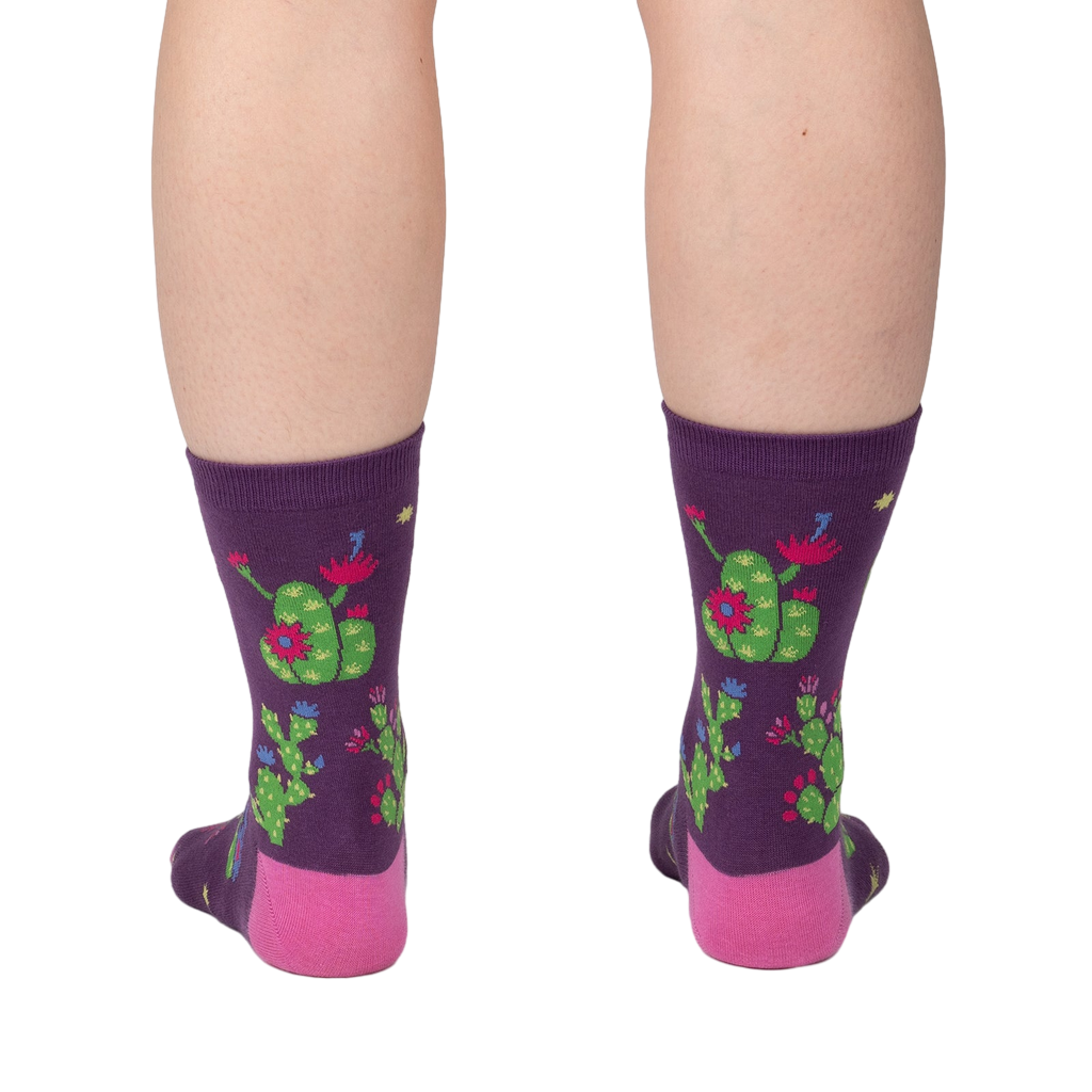 Lifestyle shot showing the socks on a person's legs, showcasing how they look when worn.