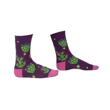 Pair of purple crew socks with a whimsical cactus and flower design. Pink accents at the heel and toe.