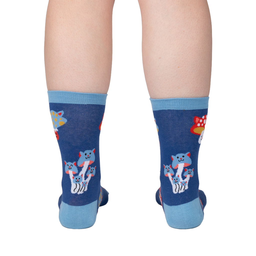 Back view of a person wearing a pair of Mushroom Cats socks, showcasing the design on the back of the socks.