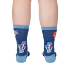 Back view of a person wearing a pair of Mushroom Cats socks, showcasing the design on the back of the socks.