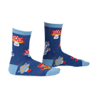 Pair of crew socks in navy blue with a whimsical design featuring cartoon cats and mushrooms in red, white, and yellow.