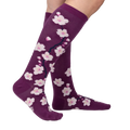 Lifestyle shot of Cherry Blossom socks on a woman's legs.