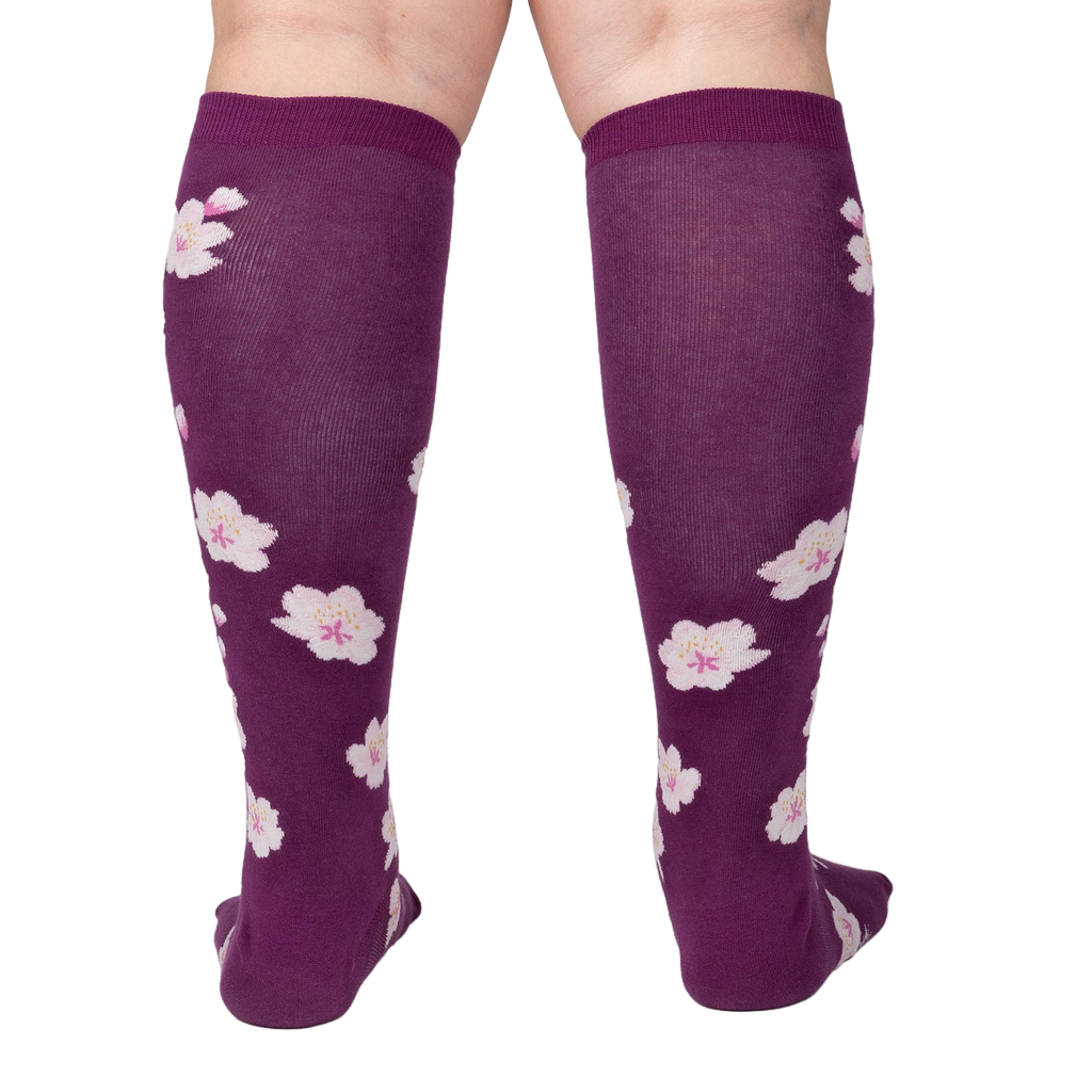Back view of Cherry Blossom knee-high socks showing the full design.