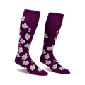 Pair of women's knee-high socks; purple with pink cherry blossom design.