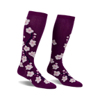 Pair of women's knee-high socks; purple with pink cherry blossom design.