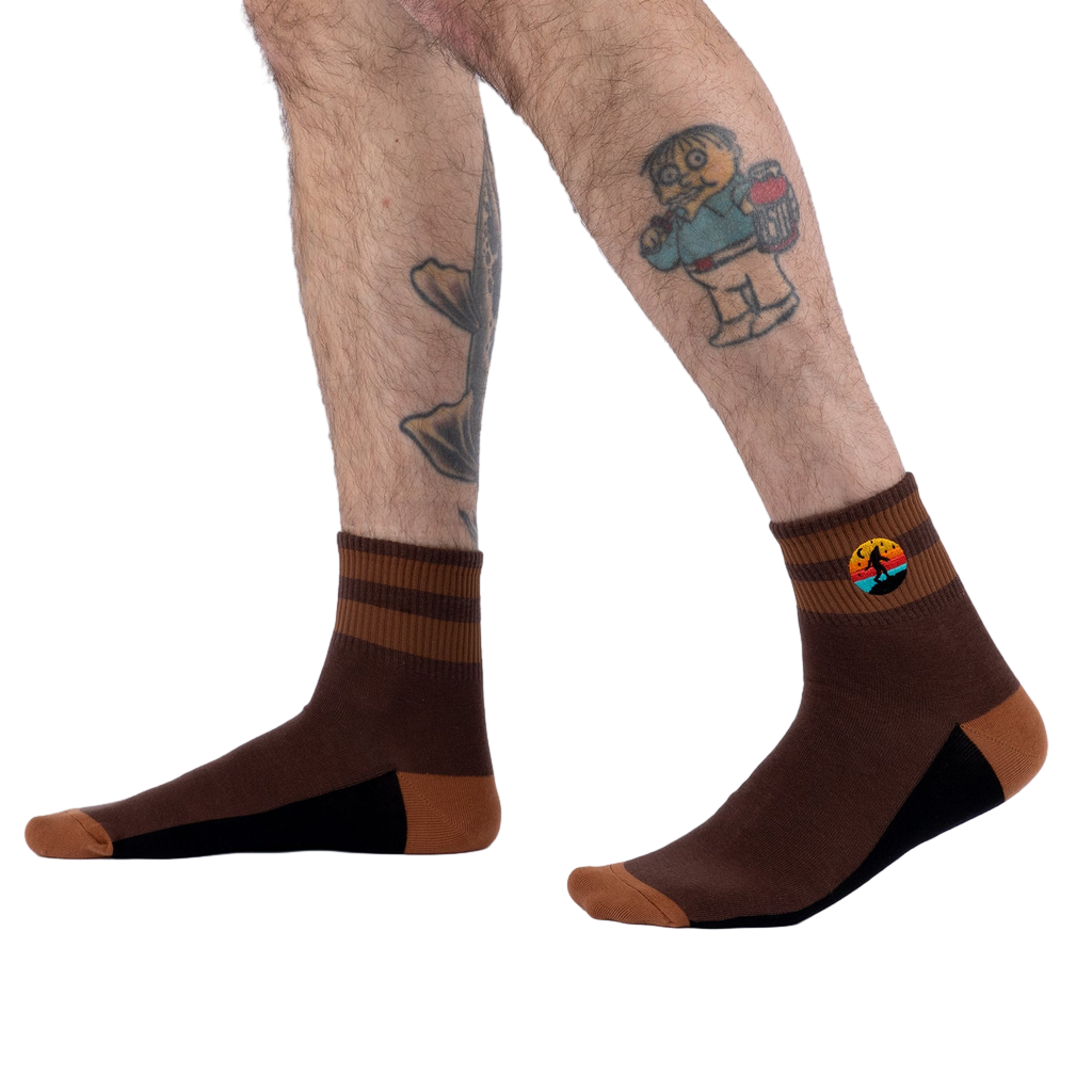 Lifestyle photo showing the socks on a model's legs.