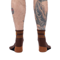 Rear view of the socks on a model's legs.